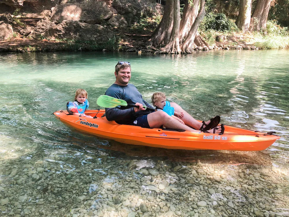 Top Weekend Trips for Single Women in the USA River access and cabins at River Bluff Cabins, a simple Texas vacation spot