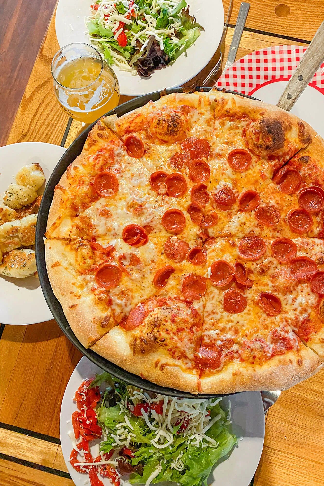 Robot serving pizza to guests at Antonio's Real NY Pizza in Estes Park