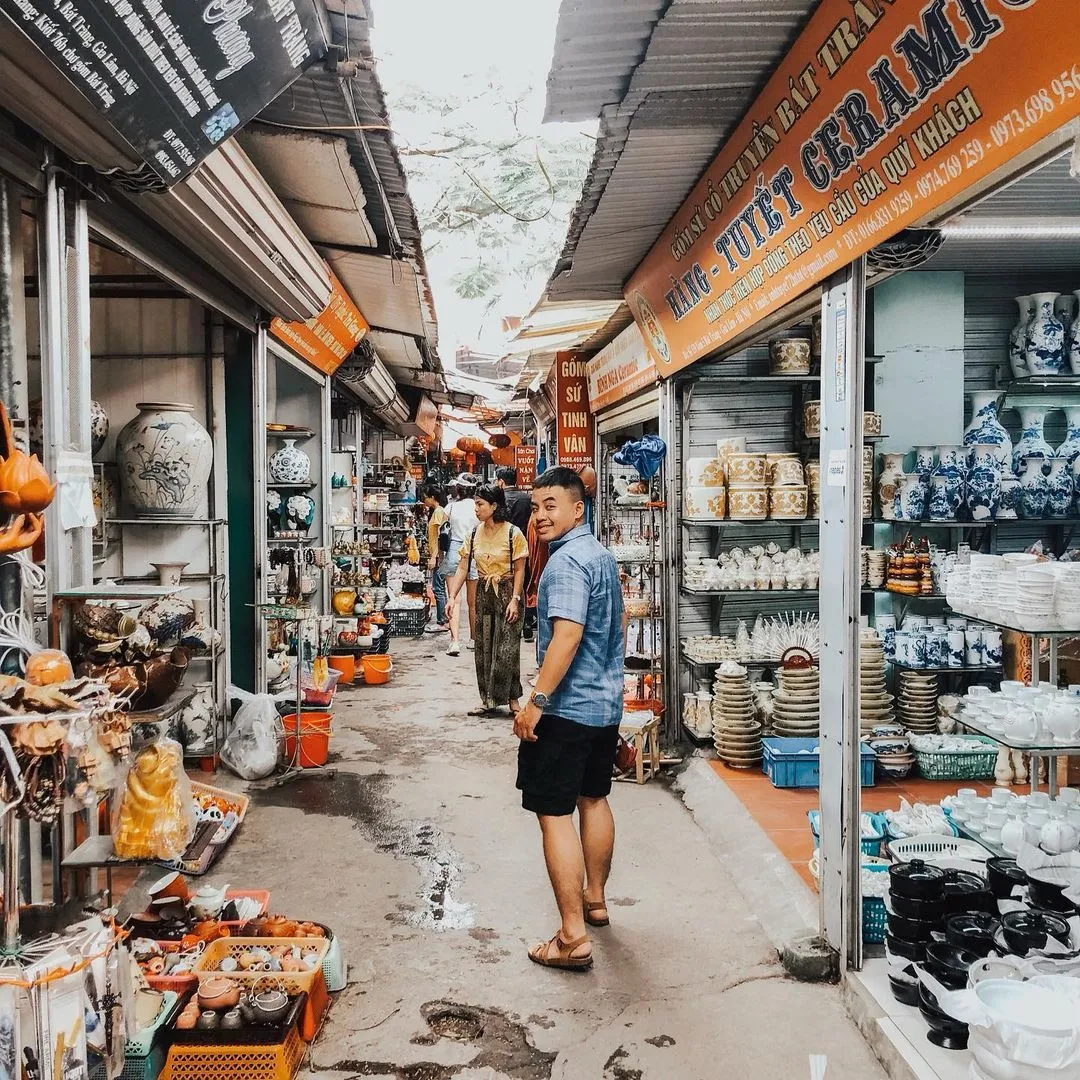 Rows of ceramic shops displaying a variety of handcrafted goods in Bat Trang Village