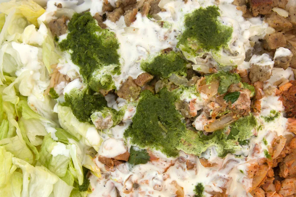Sammy's Halal Food chicken and lamb over rice with white and green sauce NYC