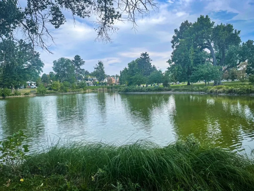 Scenic view of a lake and path in Washington Park, a popular denver what to do spot