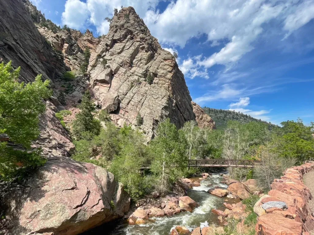 Scenic view of the towering rock walls and trees in El Dorado Canyon State Park, Colorado