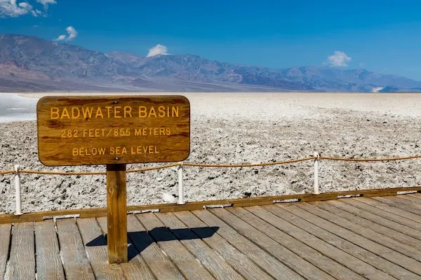Sign marking the Badwater Basin in Death Valley National Park, indicating the lowest elevation in North America