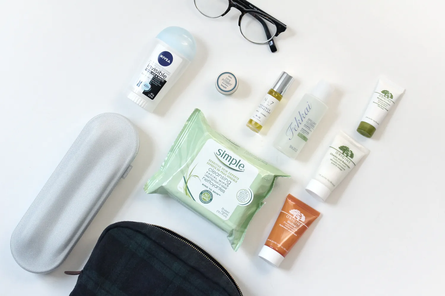 Skincare essentials for travel, packed in a bag