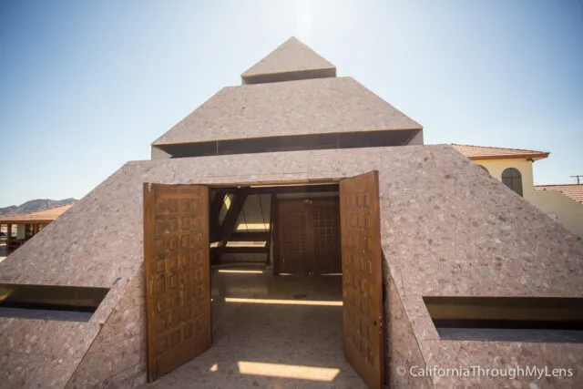 Small pyramid structure and monuments at the Center of the World site