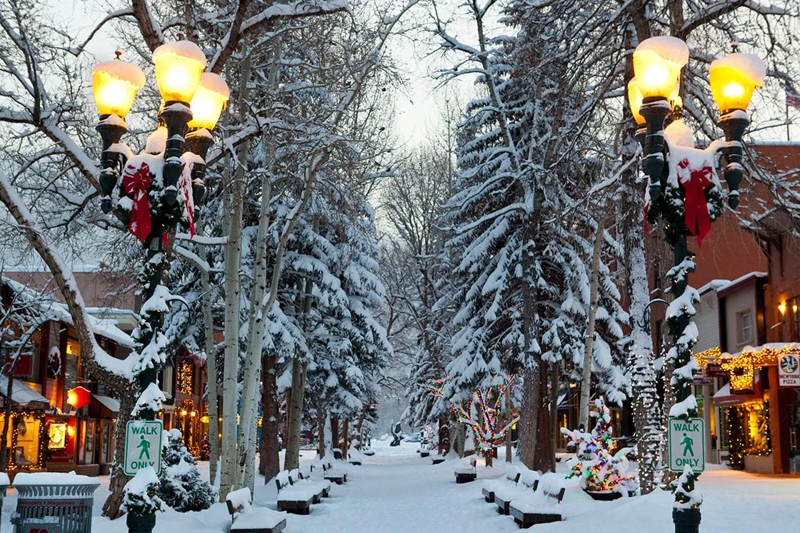 Snow-covered Aspen Walking Mall in winter, showcasing the beautiful setting for mawas aspen businesses.