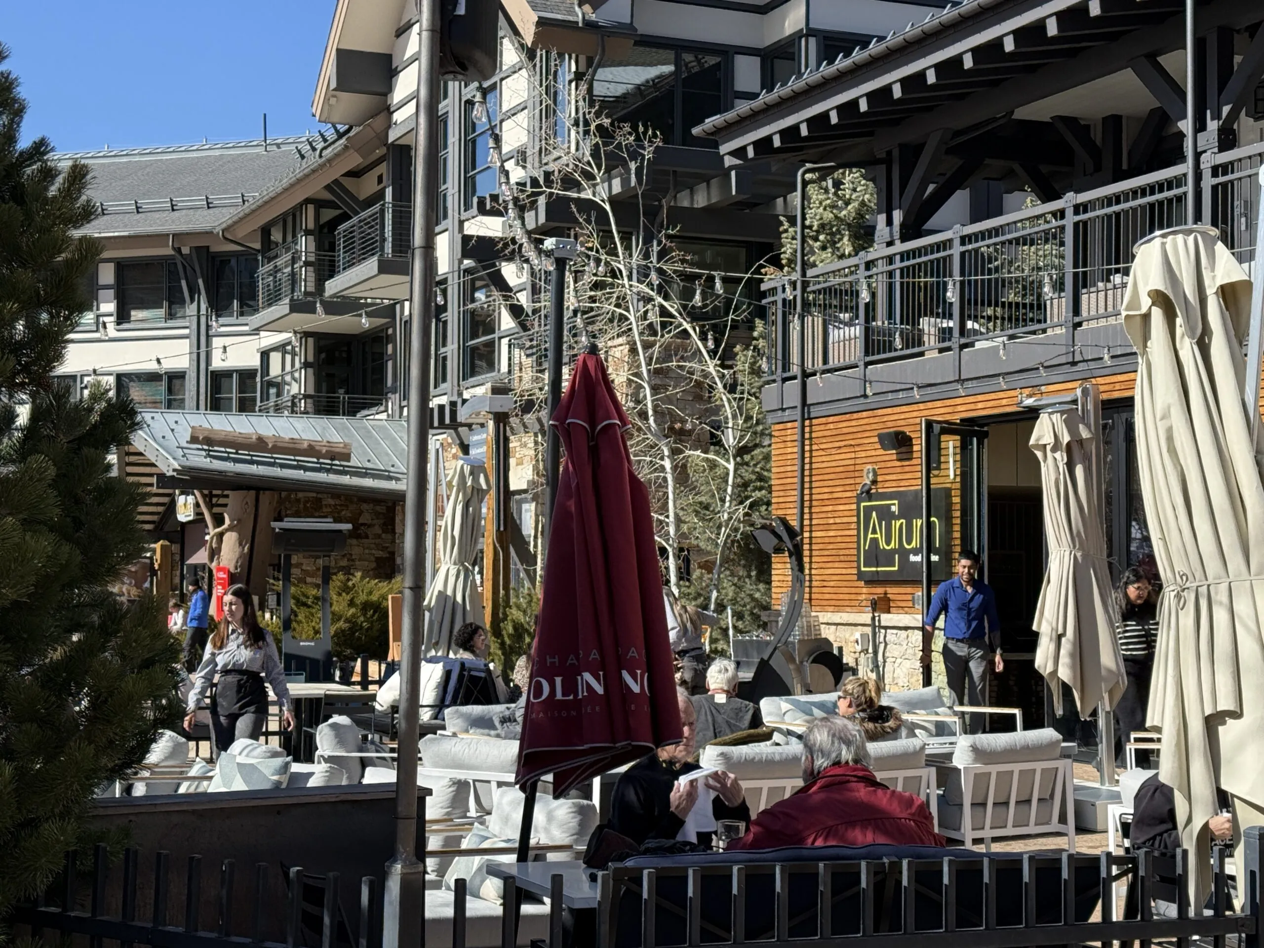 Snowmass Base Village plaza area with people