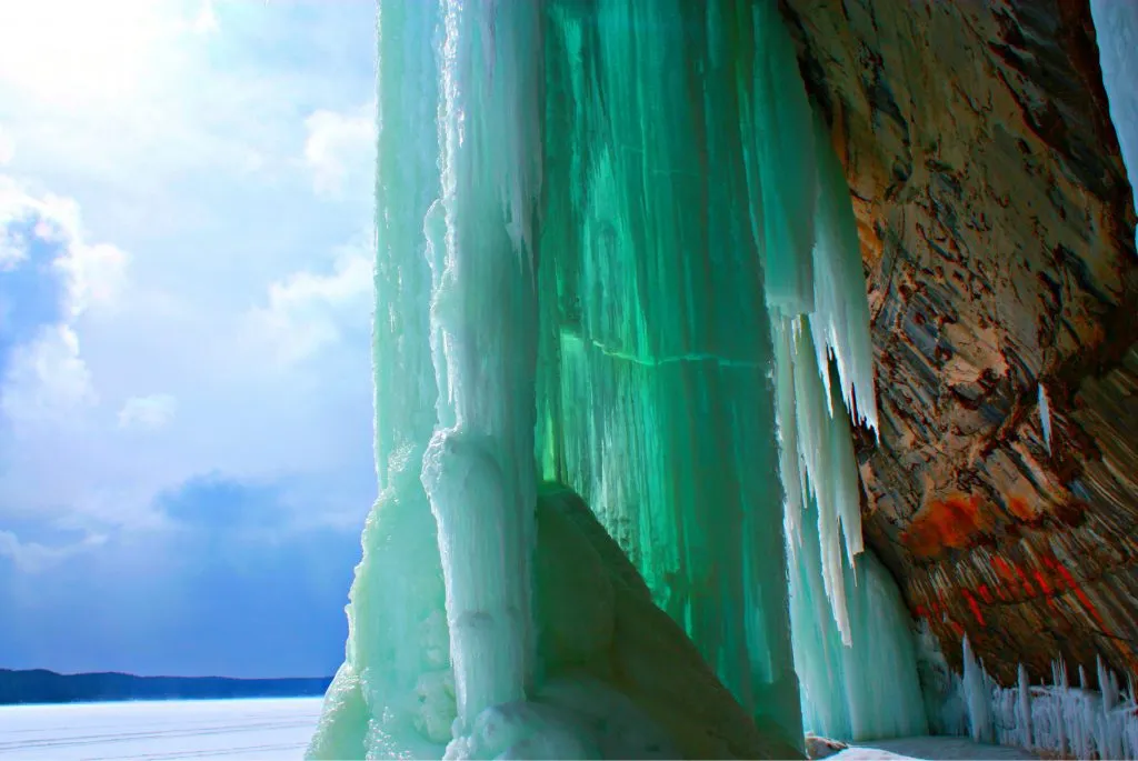 Spectacular ice formations inside the Grand Island Ice Caves, a highlight of winter activities in Michigan