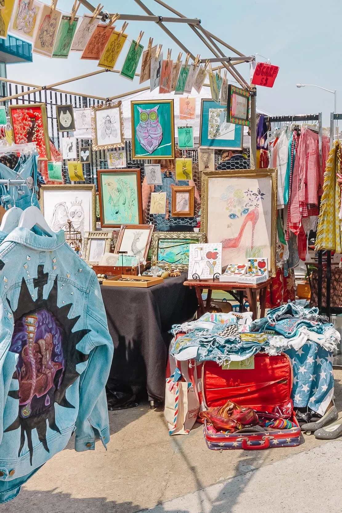 Stalls and shoppers at Brooklyn Flea market