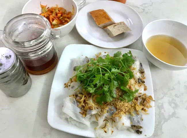 Steamed Bánh Cuốn with fillings, a popular Hanoi Specialty Food for breakfast