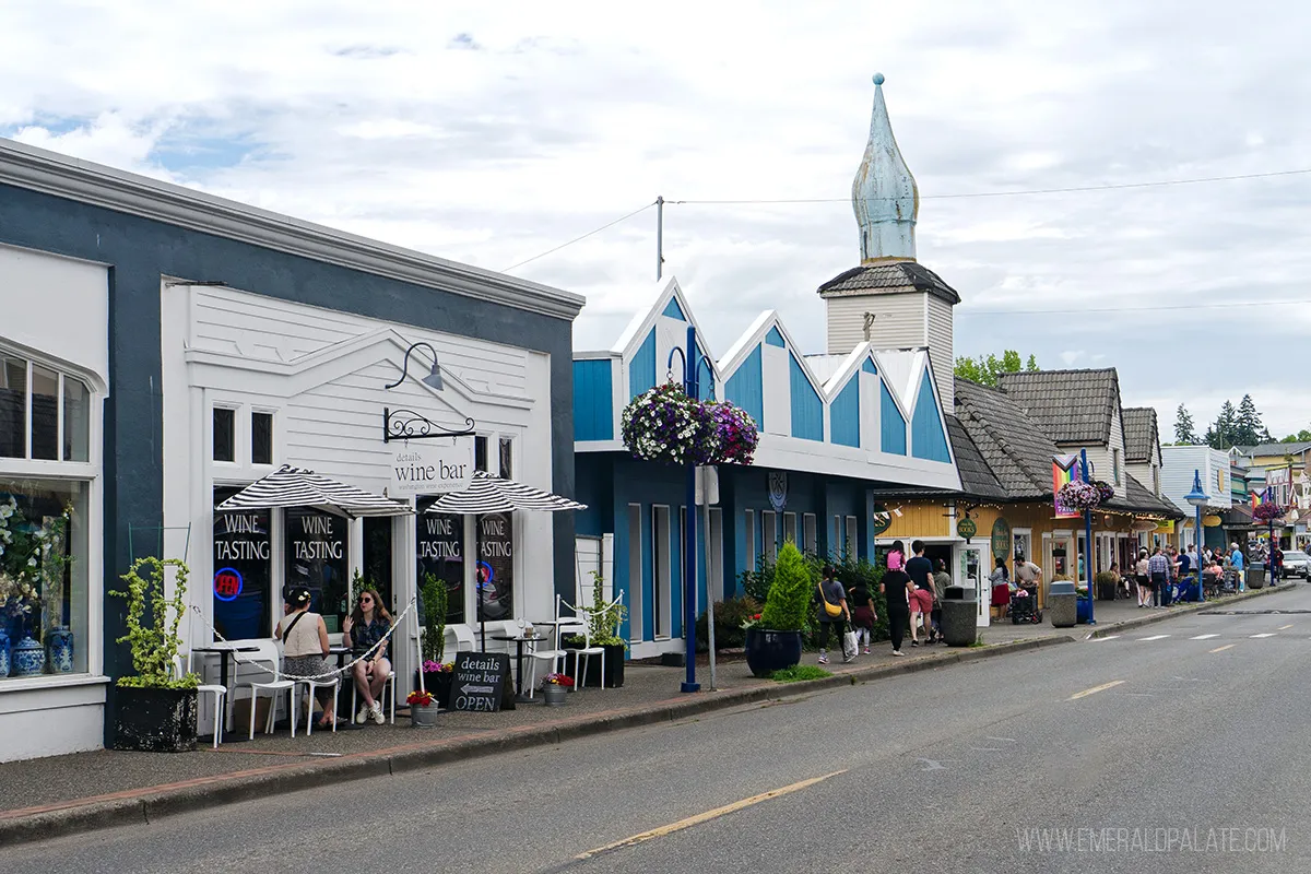 Street view of shops with colorful facades in downtown Poulsbo, WA
