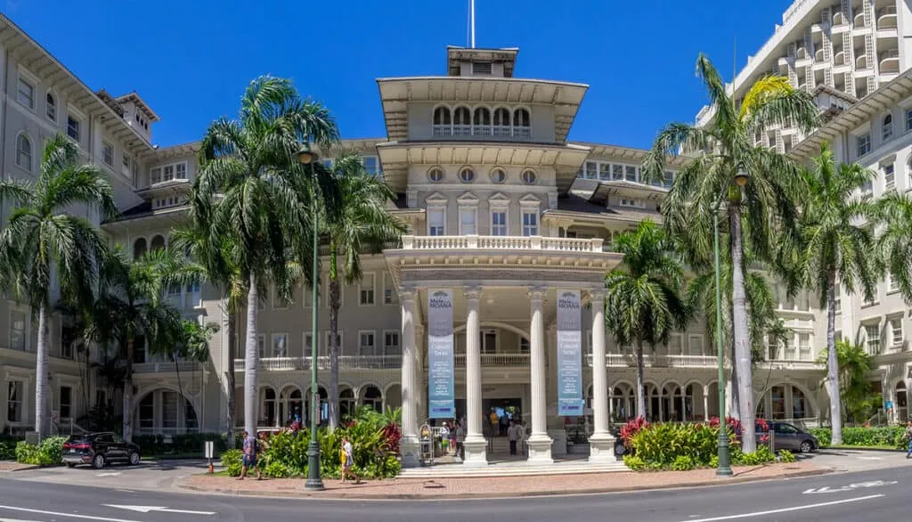 Street view of the elegant Moana Surfrider hotel in Waikiki