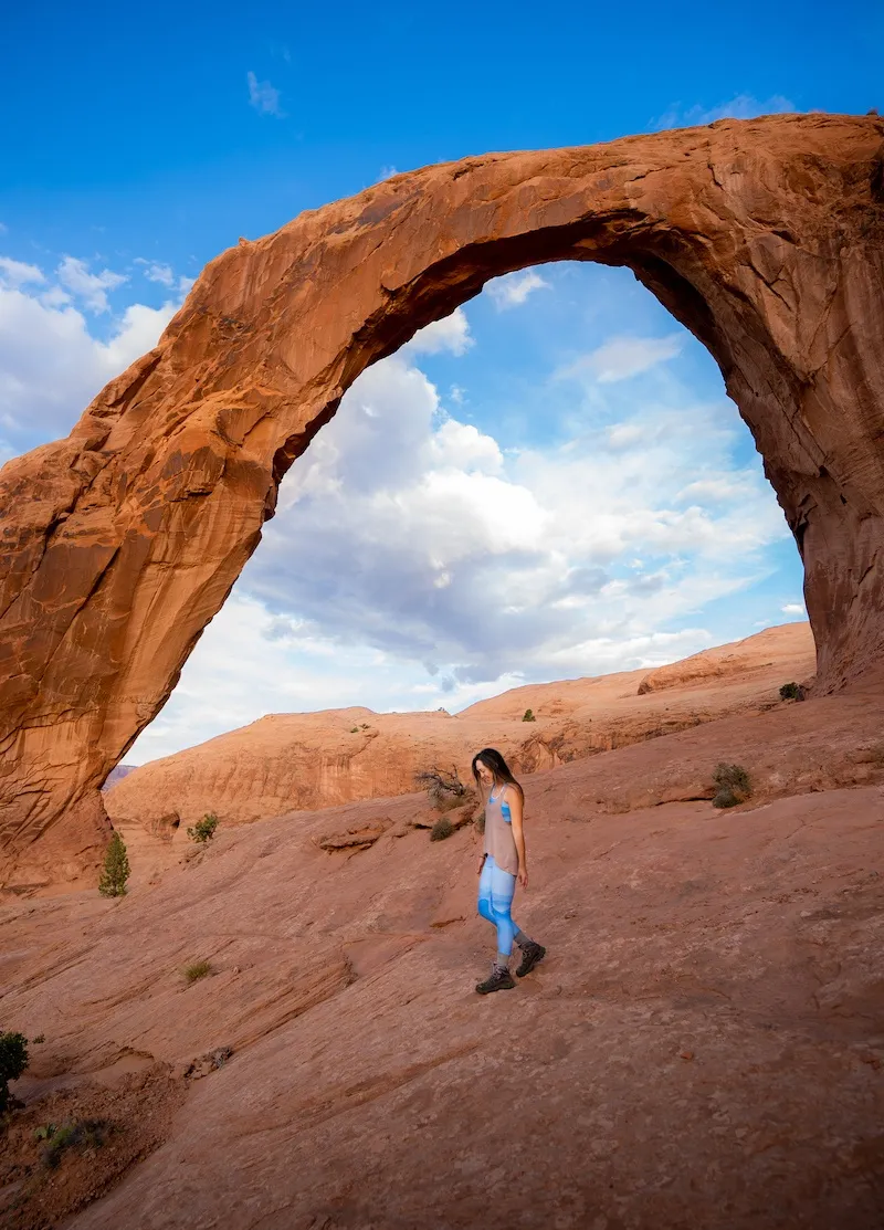 Striking red rock formation at Corona Arch near Moab, Utah, a key attraction for outdoor adventures on single women's trips