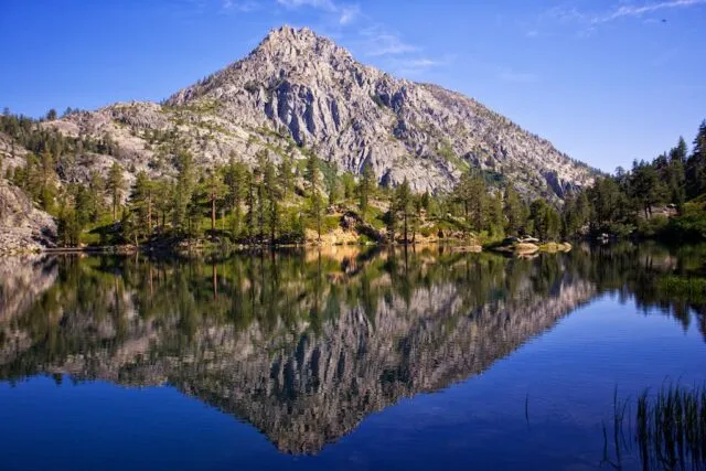 Stunning view of Eagle Lake nestled below granite peaks with Lake Tahoe in the distance