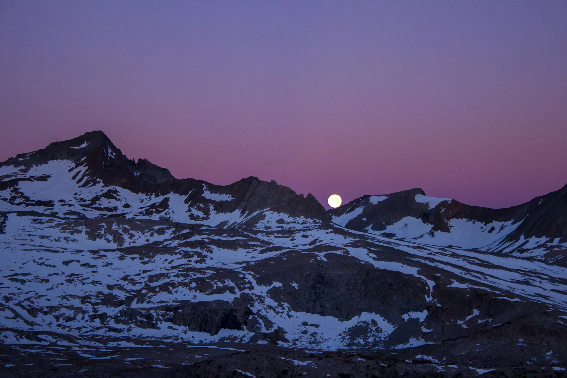 Sunrise view over a mountainous landscape from a high pass
