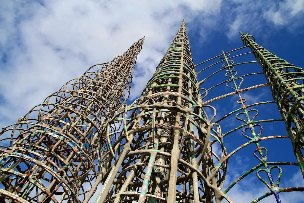 Tall, intricate spires made from steel and found objects (Watts Towers)