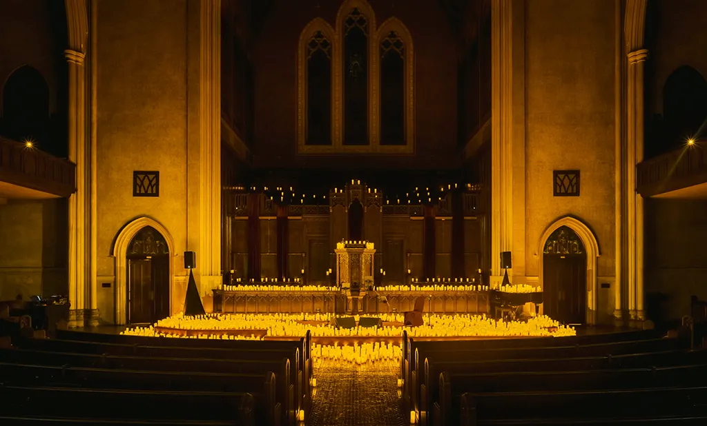 The altar inside Immanuel Presbyterian Church in candlelight.