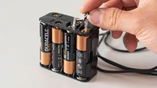 The battery pack of the Celestron Astro Fi 102 portable amateur astronomy telescope