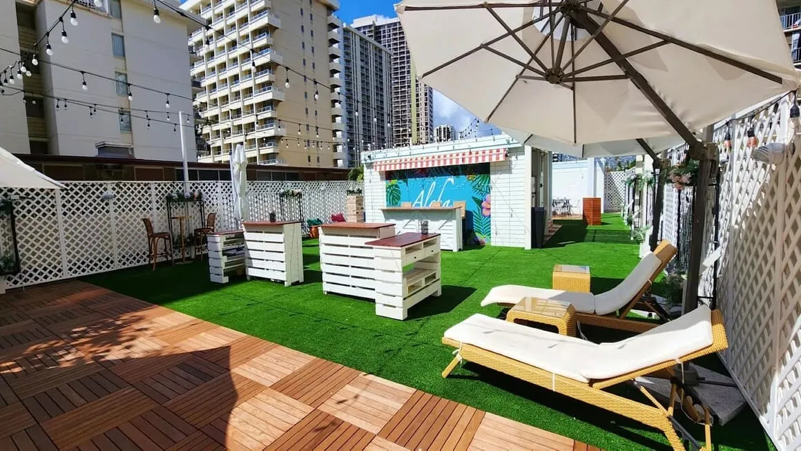 The Beach Waikiki hostel rooftop lounge, a great spot for Backpackers Oahu to socialize