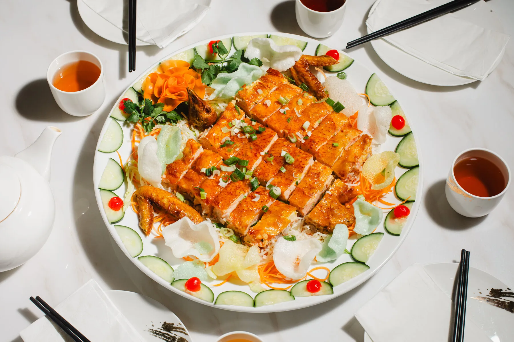 The distinctive Hakka blossom chicken dish at Hakka Cuisine, showing the unique flattened and cut presentation.
