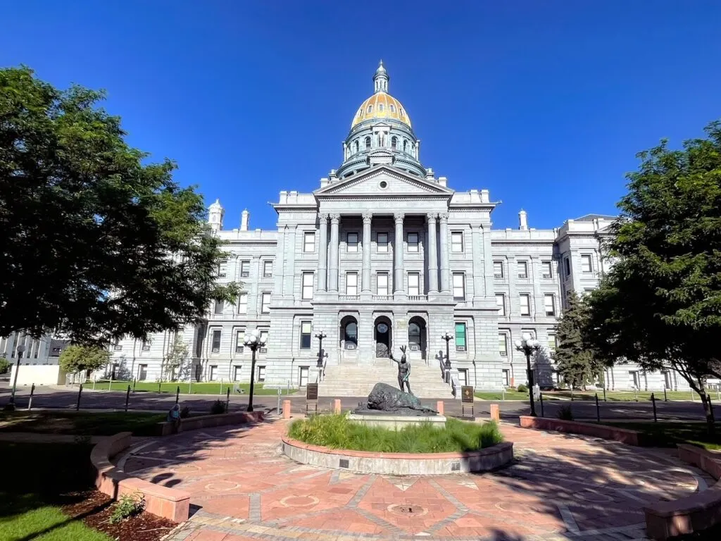 The golden dome of the Colorado State Capitol building in Denver