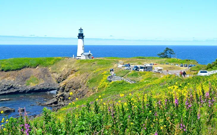The historic Yaquina Head Lighthouse stands on a rocky headland near Newport, Oregon
