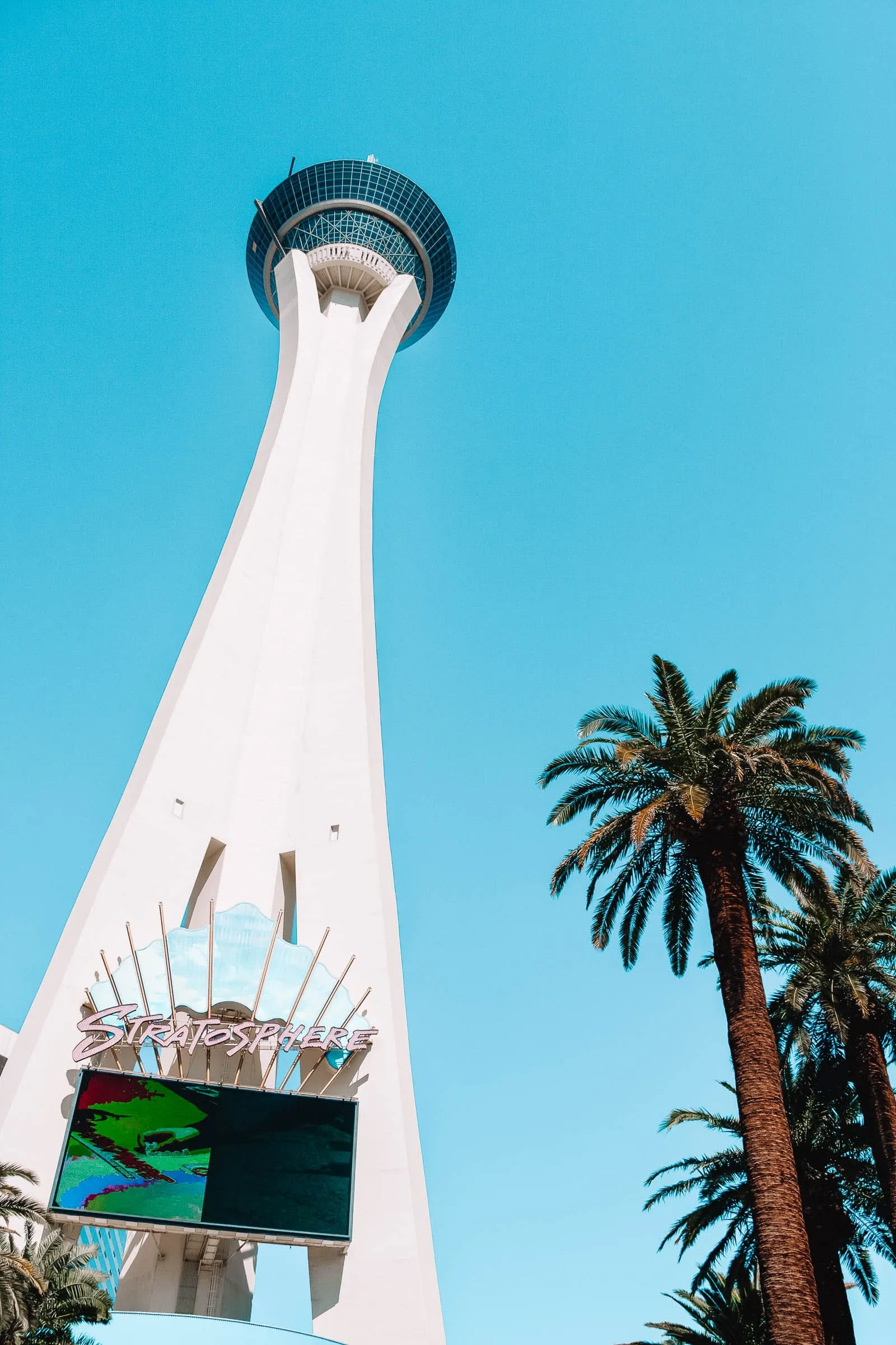 The STRAT Tower dominating the Las Vegas skyline, offering panoramic views and thrill rides
