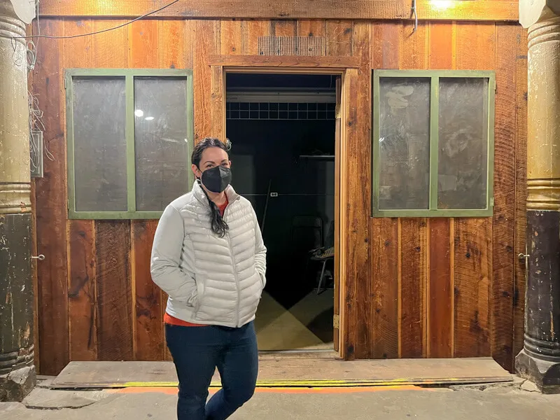 Tour guide explaining the history during the Seattle Underground Tour