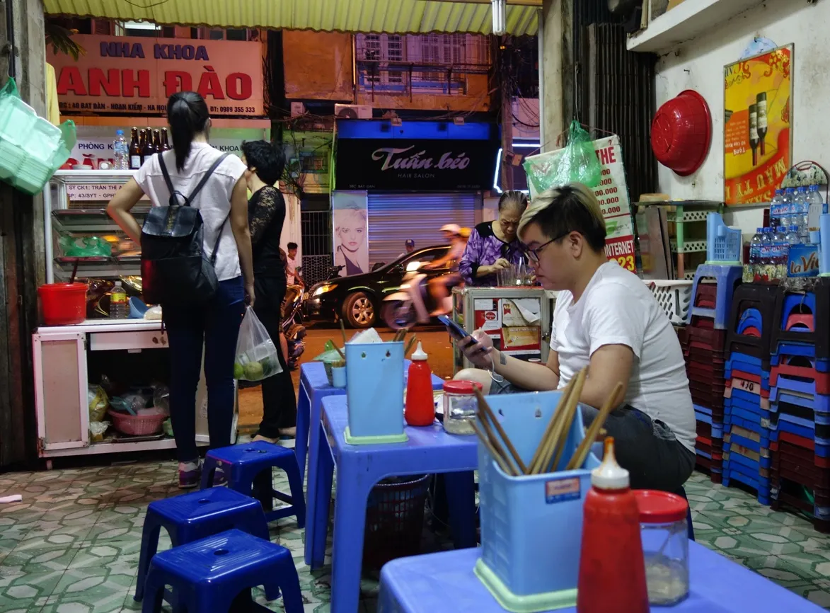 Variety of fresh herbs and leafy greens commonly used as accompaniments for Vietnamese dishes