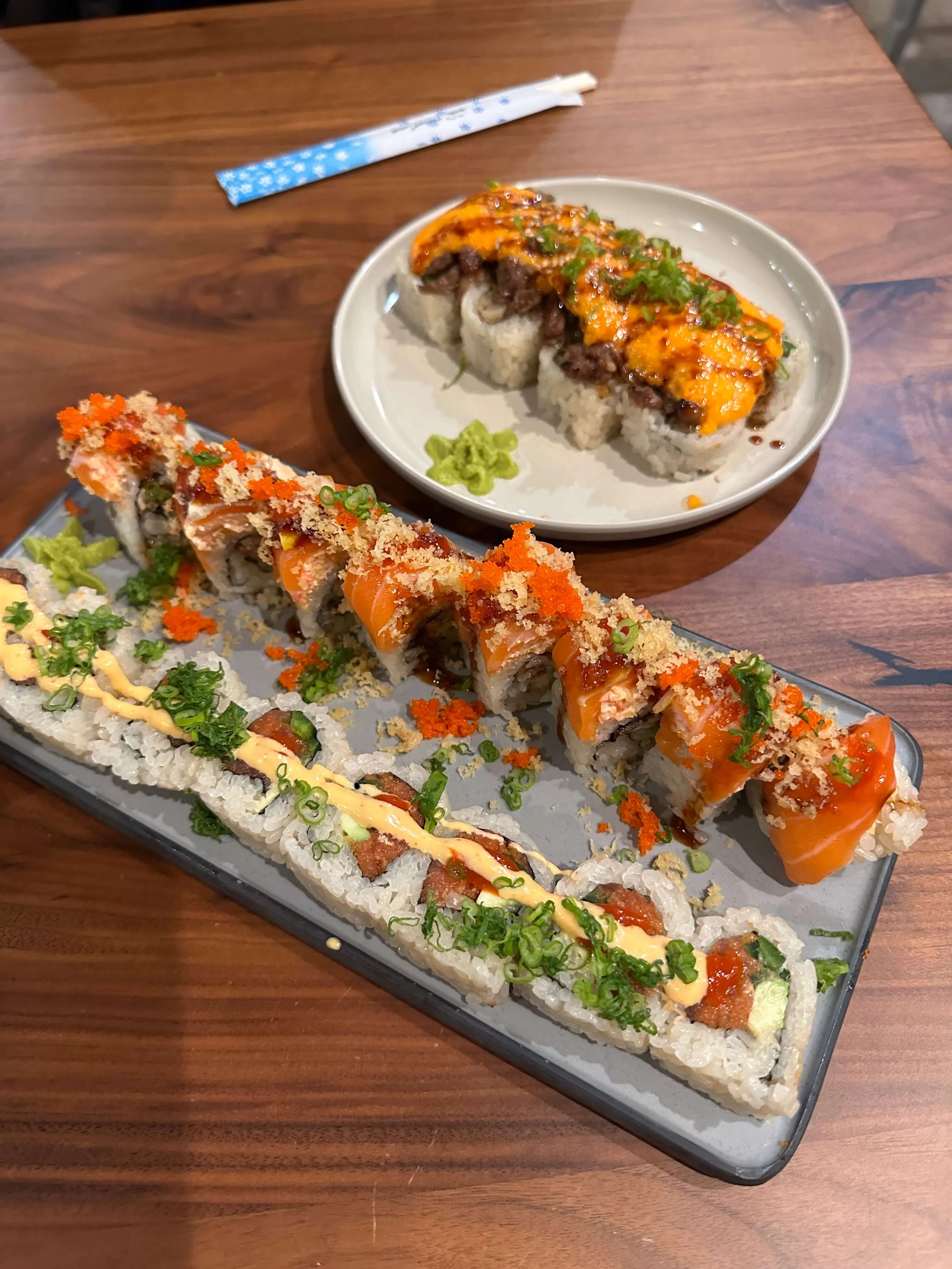 Various Americanized-style sushi rolls with generous toppings at Muse Fusion Sushi in Austin