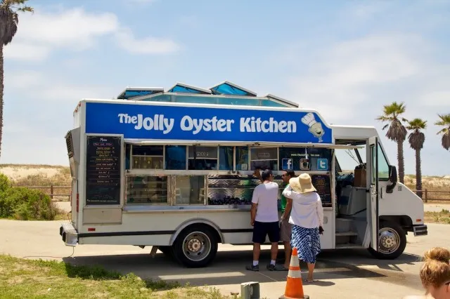 Various oysters and clams served at an outdoor stand