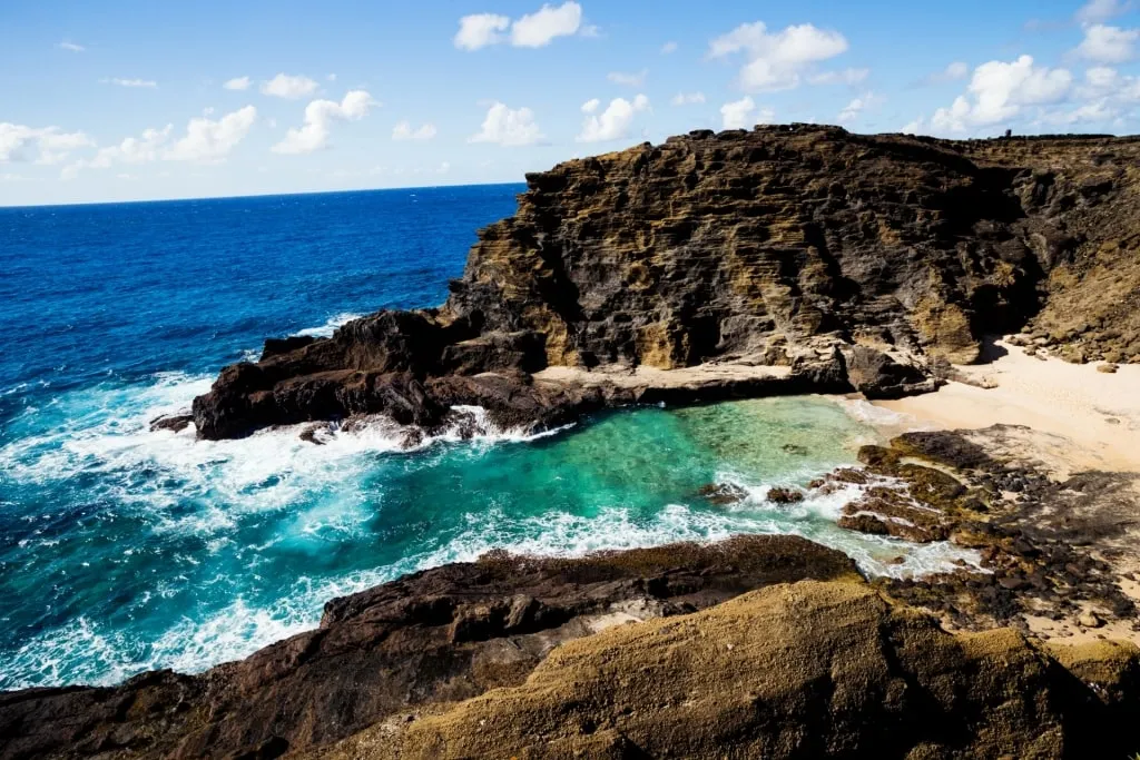 View from above showing the rocky entrance to Halona Beach Cove in Honolulu