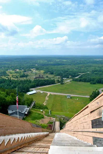 View from the top of the Pine Mountain Ski Jump in Iron Mountain, Michigan, offering a challenging climb and expansive views for those who explore the Upper Peninsula.