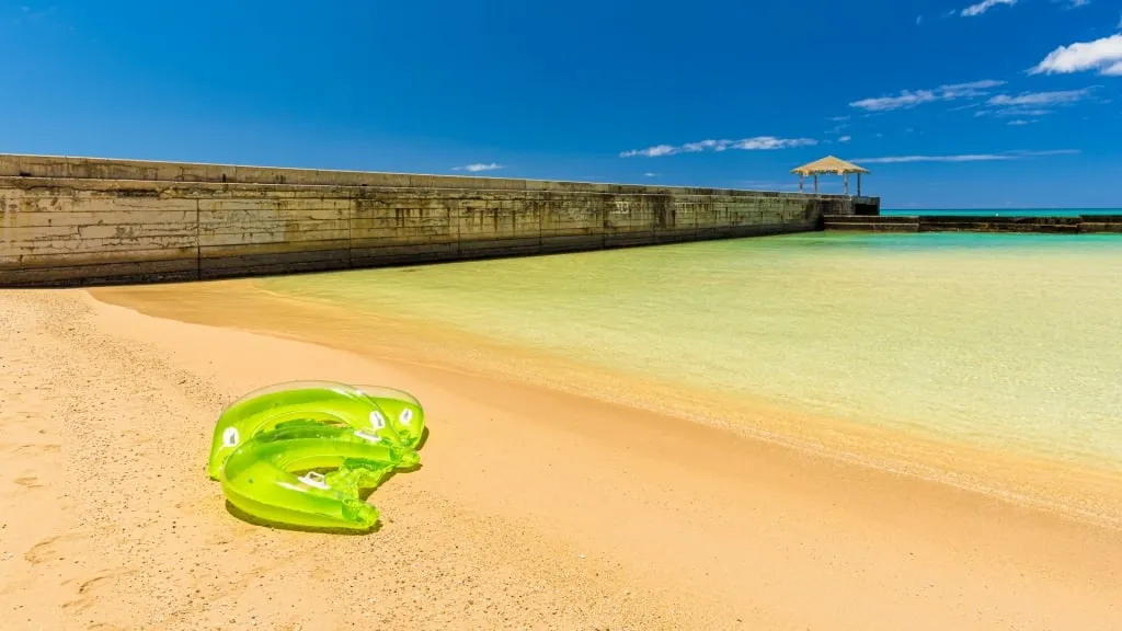 View of the Waikīkī Wall at Kūhiō Beach, creating a sheltered swimming area