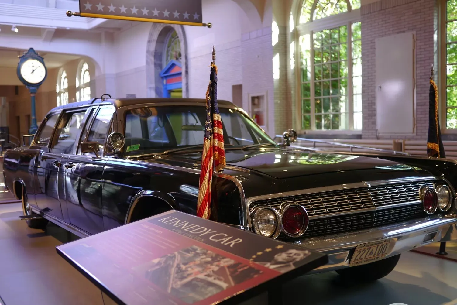 Vintage cars on display in The Henry Ford Museum, a must-see Detroit attraction.