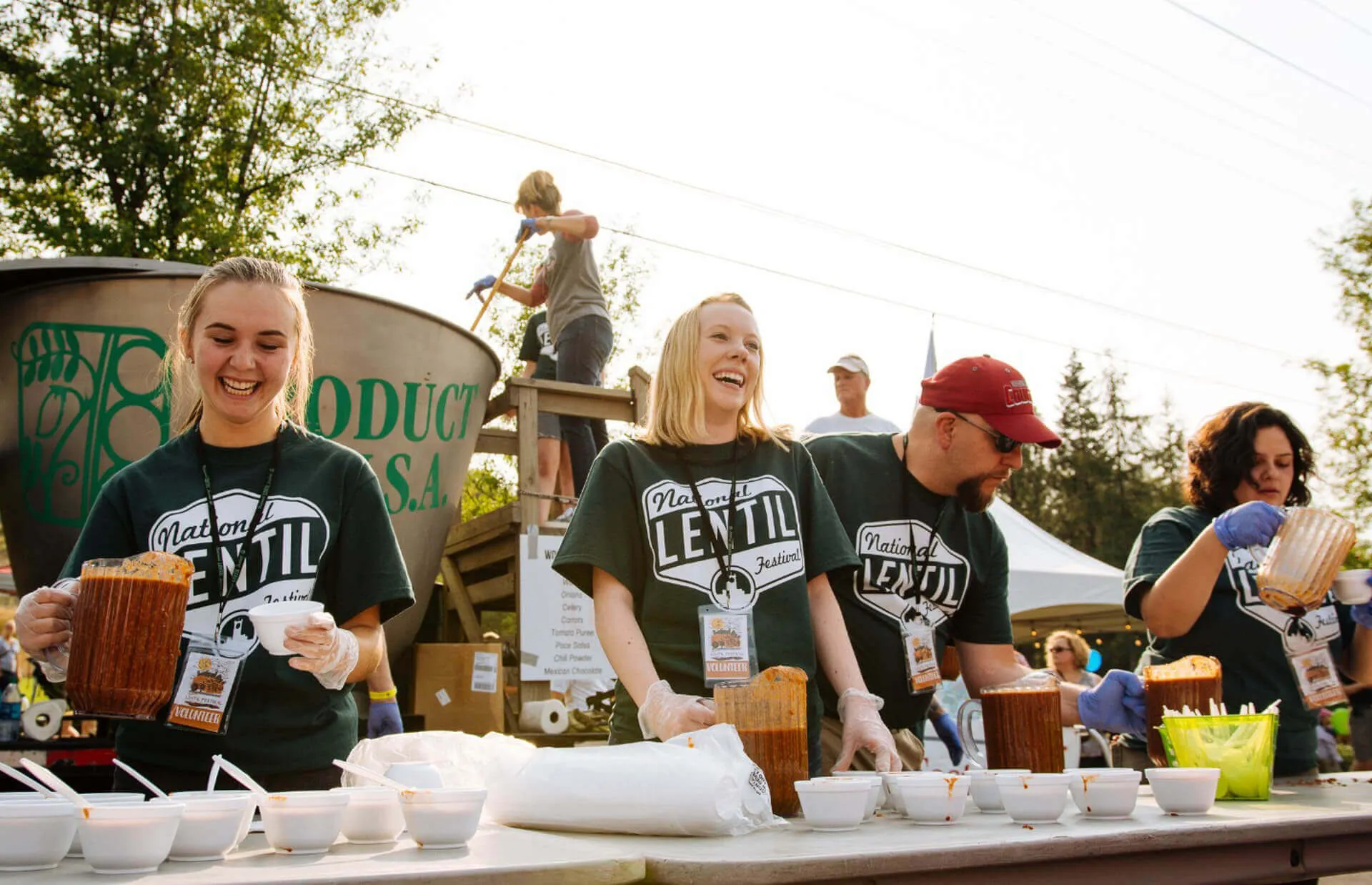 Volunteers smiling at the National Lentil Festival