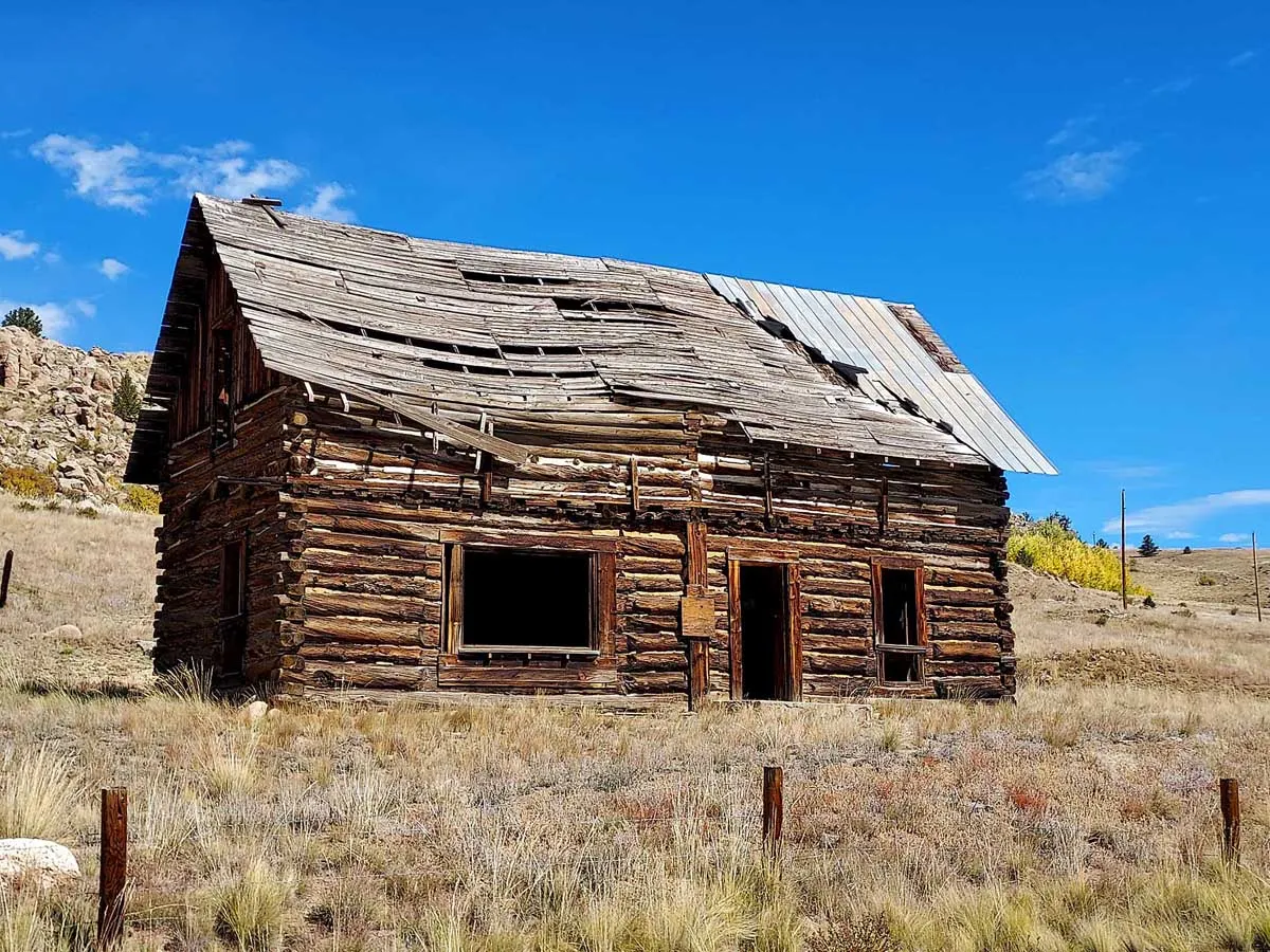 weathered cabin in terryall valley