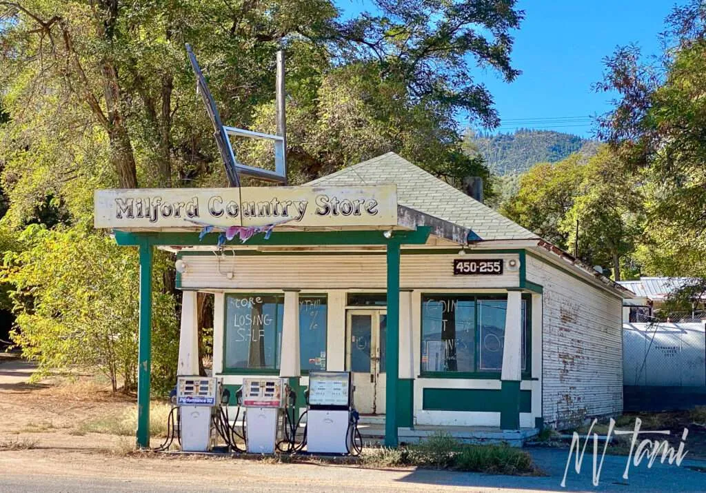 Weathered wooden building with porch in Milford, California